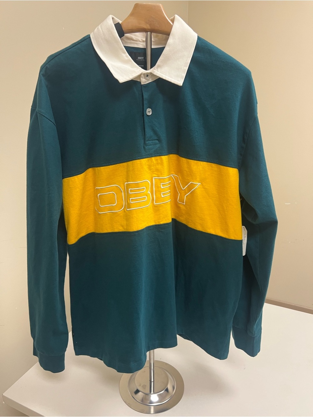 Obey Men's Teal Rugby Shirt with Yellow Chest Panel and White Collar